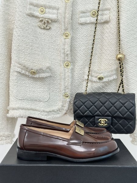 Chanel letter plaque loafers